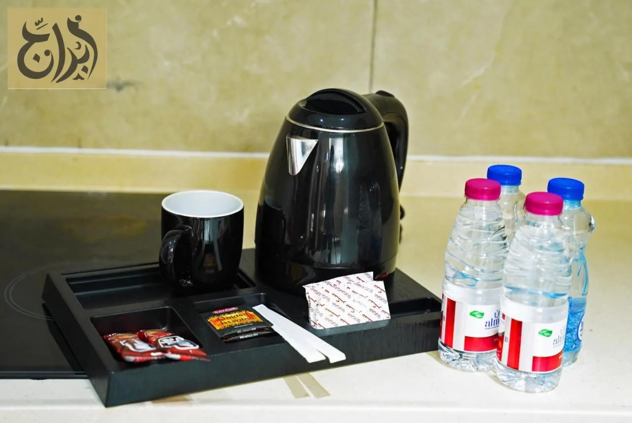 Kettle, tea tray and complimentary bottled water in every suite at Abraj Suites Hotel Doha