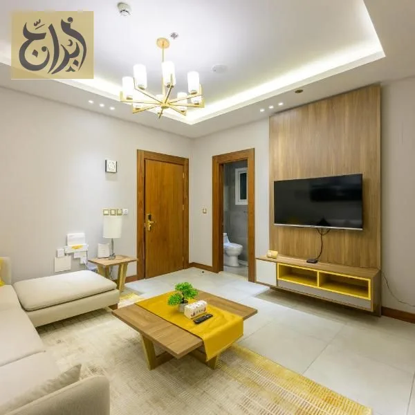 Spacious living room in a one-bedroom apartment at Abraj Suites Hotel Al Mansoura Doha
