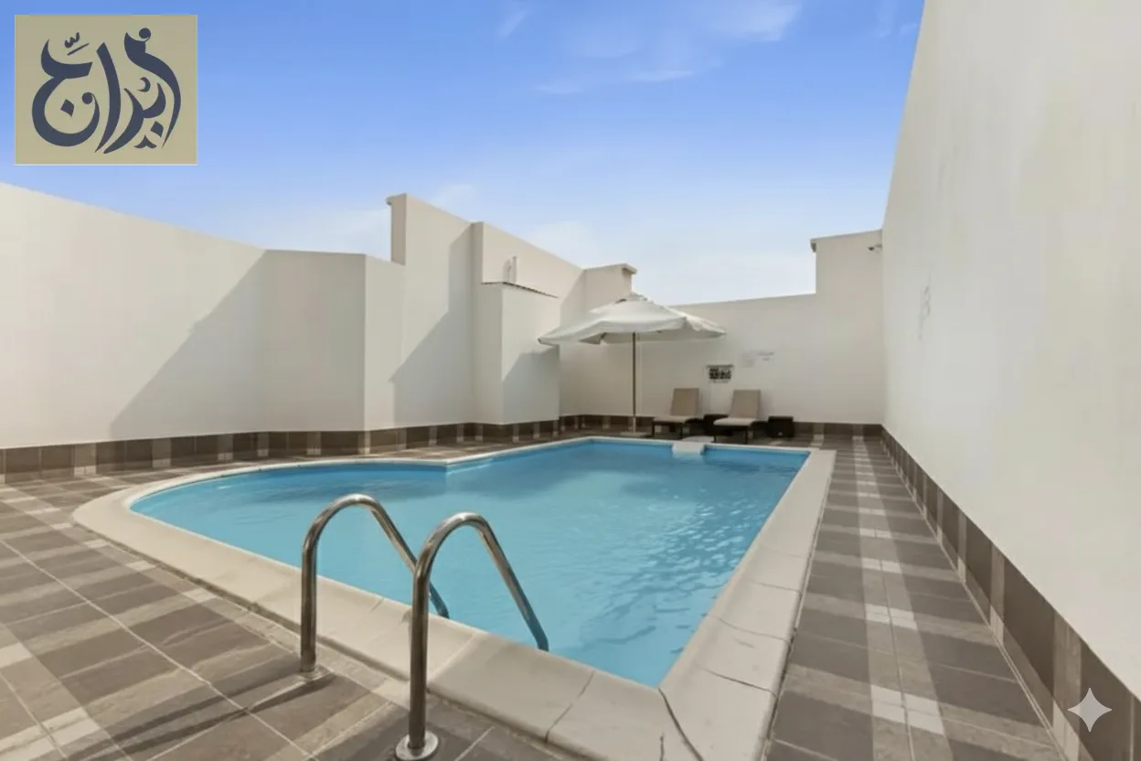 Outdoor swimming pool at Abraj Suites Hotel, Al Mansoura, Doha