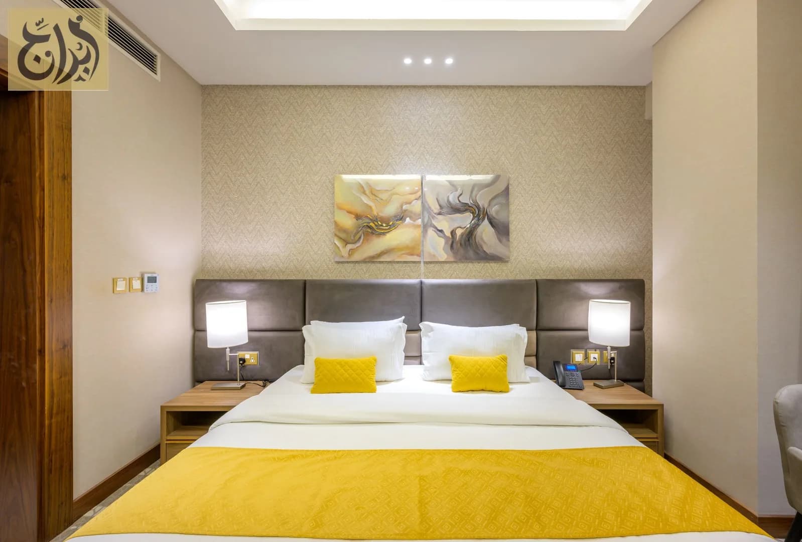 King bed bedroom in a furnished apartment at Abraj Suites Hotel, Al Mansoura, Doha